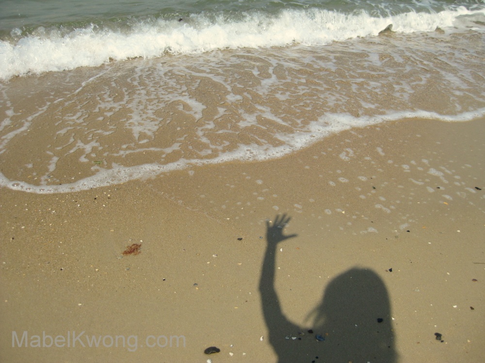 Giving myself a high five at the beach | Weekly Photo Challenge: Selfie. Photo: Mabel Kwong