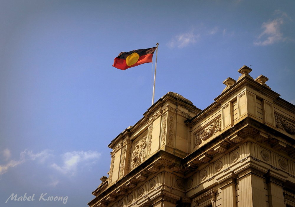 A flag we raise should be a flag we believe in. Aboriginal flag flying high in the city of Melbourne.